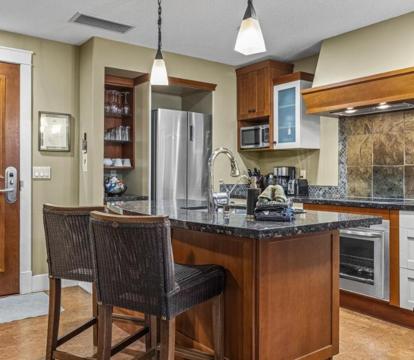 Photo of Fenwick Vacation Rental Sophisticated Mountain 2 Bedroom w Pool & Movie Theatre -