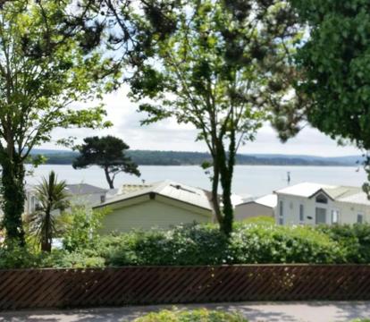 Photo of Pine Ridge 59 Rockley Park Poole with sea view