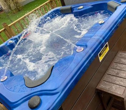 Photo of Tranquil Lodge hot tub and free golf